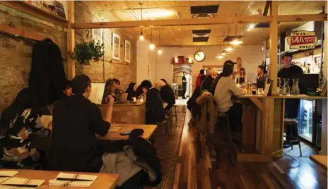  ?? TODD KOROL PHOTOS/TORONTO STAR ?? Imanishi Japanese Kitchen has just opened on Dundas St. W. The restaurant features hard, low stools that make your legs numb after sitting.