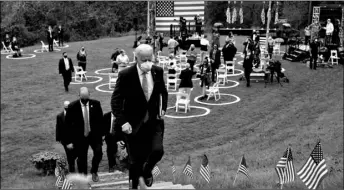  ?? AP Photo/Andrew Harnik ?? Democratic presidenti­al candidate former Vice President Joe Biden leaves after speaking at Mountain Top Inn & Resort, on Tuesday in Warm Springs, Ga.