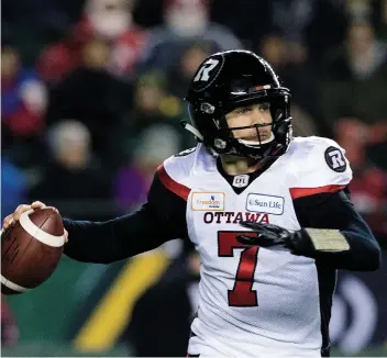  ?? DAVID BLOOM ?? Ottawa Redblacks’ quarterbac­k Trevor Harris had 288 yards passing but it was his three intercepti­ons that hurt the most in their 27-16 loss to the Calgary Stampeders in the 106th Grey Cup Game Sunday.