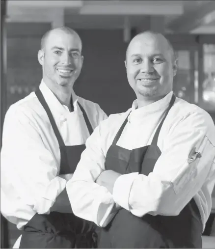  ?? Colleen De Neve/calgary Herald ?? Candela co-owner Uri Heilik, left, and chef co-owner Rogelio Herrera have moved to a more convention­al location with their new restaurant.