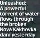  ?? ?? Unleashed: A powerful torrent of water flows through the broken Nova Kakhovka dam yesterday