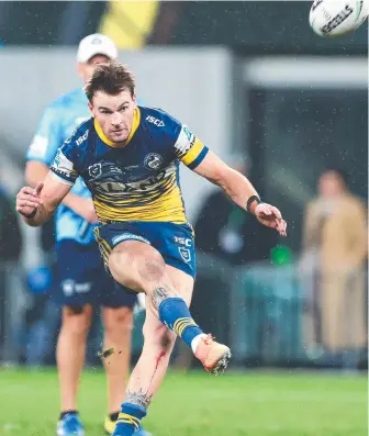  ?? Picture: AAP ?? Parramatta’s Clint Gutherson kicks the winning field goal against Canberra last night