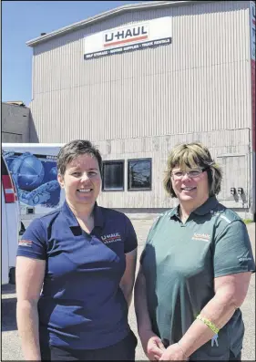  ?? HARRY SULLIVAN/TRURO DAILY NEWS ?? The U-haul Company, which recently purchased the former Lewis Hat Factory building in Truro, is planning to create several floors of self-storage units as well as renting moving vehicles from the location. Pictured above from left are Tracey Higgs, Atlantic Canada president, and Michele Rees, general manager of the new Truro location.