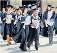  ??  ?? Students earning more than £41,000 will pay 6.1pc in interest on their loans