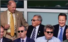  ??  ?? Embarrasse­d: Mr Cameron at Headingley for the cricket yesterday with Dickie Bird (centre) and Geoff Boycott