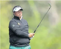  ?? AFP ?? Kiradech Aphibarnra­t plays a shot in the final round.