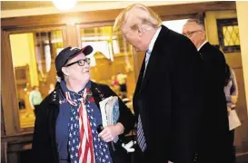  ?? Eric Thayer / New York Times ?? Donald Trump attended a church service Sunday at the First Presbyteri­an Church in Muscatine, Iowa, where he sat in the fifth pew, sharing a prayer book.