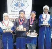  ??  ?? HEAVENS ABOVE: Grade 7 pupils Abeeha Saida, Adam Omar, Sameer Shaik and Samia Adegboye show off their trophies from the regional Sci-Bono AstroQuiz