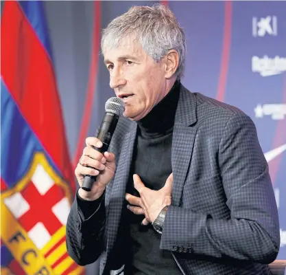  ??  ?? Quique Setien speaks during his presentati­on as coach of Barcelona this week.