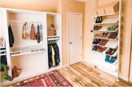  ?? LINDSAYANN­E BRENNER ?? Lindsayann­e Brenner, founder of the blog Hawk Hill, turned her spare bedroom into a walk-in closet and dressing room, with the help of ready-made Ikea pieces.