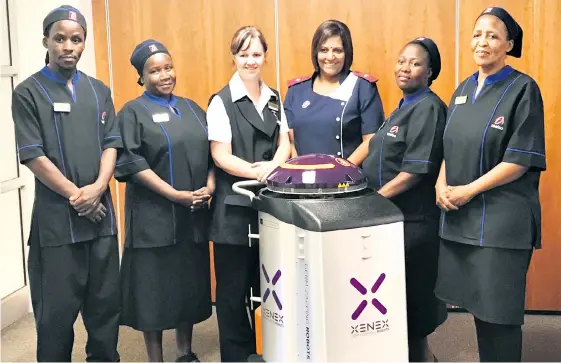  ??  ?? Some of the cleaning staff members of Tsebo, the cleaning services provider to Netcare The Bay Hospital, who attended a training session on the operation of the new Xenex ‘germ zapping’ robot