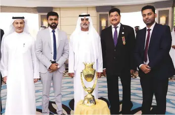  ?? Courtesy: ACC ?? The Unimoni Asia Cup Trophy unveiled by Shaikh Nahyan in the presence of Khalid Al Zarouni, Prabhakara­n Thanraj, Dr. B.R. Shetty and Mubashshir Usmani in Abu Dhabi.