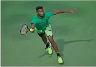  ?? AFP ?? Frances Tiafoe plays a shot against Konstantin Kravchuk. —