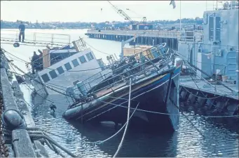  ??  ?? The wrecked Rainbow Warrior after French intelligen­ce planted bombs on the vessel