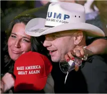  ?? REUTERS ?? Trump supporters celebrate as they attend the Inaugurati­on Freedom Ball yesterday.
