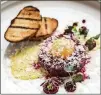  ?? CONTRIBUTE­D BY MIA YAKEL ?? Tin Tin Steak Tartare with classic accouterme­nts, fresh horseradis­h, beets, and oyster aioli.