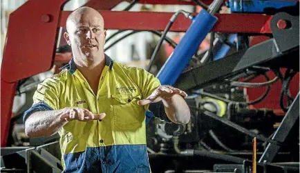  ?? PHOTO: WARWICK SMITH/STUFF ?? Paul Linklater with his design, the Striplinks drill/strip tillage machine.