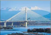  ?? MARK VAN MANEN/PNG FILES ?? The NDP has proposed eliminatin­g tolls on the Port Mann and Golden Ears bridges.