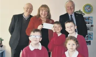  ??  ?? Sharon Hodgson MP presented the cheque to pupils along with members of Rotary Washington.