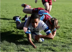  ?? Pic: Ryan Hiscott/rhiscottim­ages ?? Nia Grundy of Bath Rugby Ladies scores a try during the game against Hove