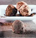  ?? ABEL URIBE/CHICAGO TRIBUNE; JOAN MORAVEK/FOOD STYLING ?? Chocolate, butter and coffee are rolled into balls to become truffles, then finished with a coating of cocoa powder. Keep chilled until ready to serve.