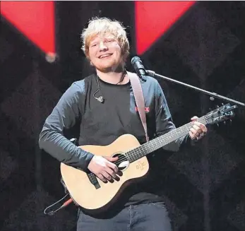  ?? Angela Weiss AFP/Getty Images ?? ED SHEERAN’S “÷” was the most-consumed album of 2017, according to Nielsen Music’s computatio­n.