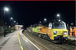  ??  ?? Colas Rail Class 70 70813 is in charge of the 6C98 14:12 Eastleigh Yard to Crediton CWR train on November 26, 2020 as it awaits entry onto the Okehampton Branch to unload the rails along the branch between the former junction at Coleford and Okehampton. Colas 66849 Wylam Dilly was at the rear of the train. (Tom Braund)