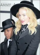  ?? PICTURE: EPA ?? Madonna and her son, David Banda Mwale, in Los Angeles. Madonna has applied to adopt two more children from Malawi.