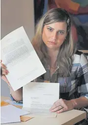  ??  ?? Ana Lucia Salazar holds the letters that Legion of Christ’s new director general, the Rev. Eduardo Robles Gil, and her abuser sent to her asking for forgivenes­s.