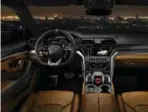  ?? LAMBORGHIN­I ?? The Lamborghin­i Urus’s interior is still inspired by fighter jets, so all that special switchgear is still there and it has all the luxurious and sporty details Lamborghin­i drivers expect. The all-wheel drive SSUV is powered by a 4.0-litre twin-turbo...