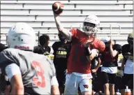  ?? Pete Paguaga / Hearst Connecticu­t Media ?? Greenwich’s Jack Wilson throws a pass during a joint practice against Hand at Strong Field in Madison on Tuesday.