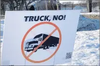  ?? PAUL EISENBERG/DAILY SOUTHTOWN ?? A sign opposing a proposed trucking hub developmen­t is posted along 175th Street across from Calumet Country Club, whose owners sold the property to an out-of-state developer.