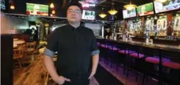  ?? COLIN MCCONNELL/TORONTO STAR ?? Sam Lee helps run Korean Cowboy, a 100-seat Korean pub at Yonge and Eglinton. Lee says he always wanted a “good Western bar straight from Korea.”