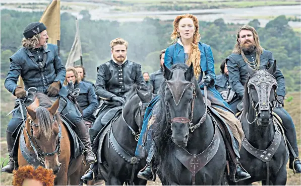  ??  ?? Saoirse Ronan plays Mary Stuart, above, in the forthcomin­g film Mary, Queen of Scots, with, from left, Ian Hart as Lord Maitland, Jack Lowden as Lord Darnley and James Mcardle as Mary’s half-brother, the Earl of Moray. Inset: Margot Robbie as Elizabeth I