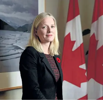  ?? SEAN KILPATRICK/THE CANADIAN PRESS ?? Environmen­t Minister Catherine McKenna poses for a photo in her office on Parliament Hill in Ottawa last week.