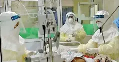  ??  ?? Nurses wearing yellow and white PPE in the forefront of the COVID-19 battle.They should be provided the opportunit­y to become medical practition­ers