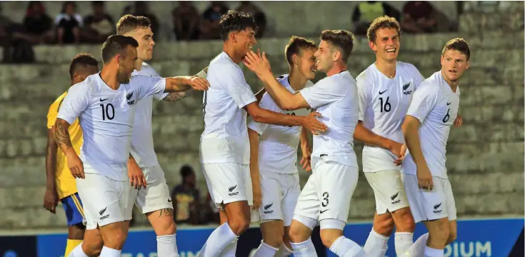  ?? Photo: OFC Media ?? New Zealand Under 23 players celebrate after defeating Solomon Islands in the final pool match of the OFC Men’s Olympic Qualifiers at the ANZ Stadium in Suva.