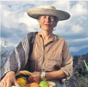  ?? ?? Diana Kennedy picking fruit in her garden and, right, in 2015, shopping at a market near her home in the hills of western Mexico