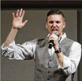  ?? DAVID J. PHILLIP, ASSOCIATED PRESS ?? Richard Spencer, shown in December, who leads a movement that mixes white nationalis­m and populism, speaks at the Texas A&M University campus in College Station, Texas. An associate of Spencer’s sued Ohio State University after it refused to rent...