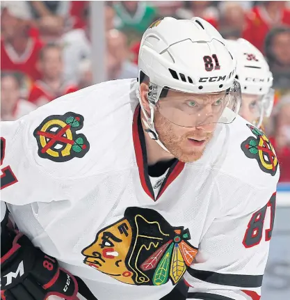  ??  ?? The Blackhawks’ Marian Hossa will miss the entire 2017-18 NHL season because of a progressiv­e skin disorder.