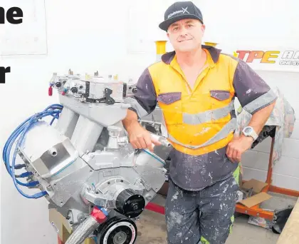  ?? Photo / Bevan Conley ?? Glenn Brewer with the 632ci engine that will soon live in this 1972 Holden HQ Ute.