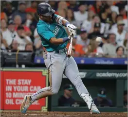  ?? BOB LEVEY – GETTY IMAGES/TNS ?? Julio Rodriguez of the Seattle Mariners went 4for 6on Saturday night against the host Houston Astros, giving him at least four hits in four consecutiv­e games.