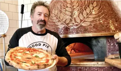  ?? PROVIDED ?? Jonathan Goldsmith at his Ravenswood pizzeria, Spacca Napoli, at 1769 W. Sunnyside. The eatery was recently voted one of the top pizzerias in the world for 2023, according to the Italy-based “50 Top Pizza World.”