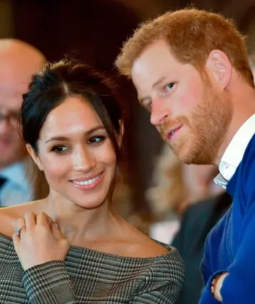  ??  ?? LOVE MATCH: Meghan Markle with husband-to-be Prince Harry