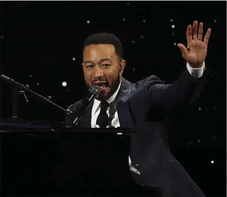  ?? THE ASSOCIATED PRESS ARCHIVES ?? R&B star John Legend is among the pop music stars who are posting performanc­es from their homes and other unusual locales, with concert tours canceled due to the coronaviru­s pandemic.
