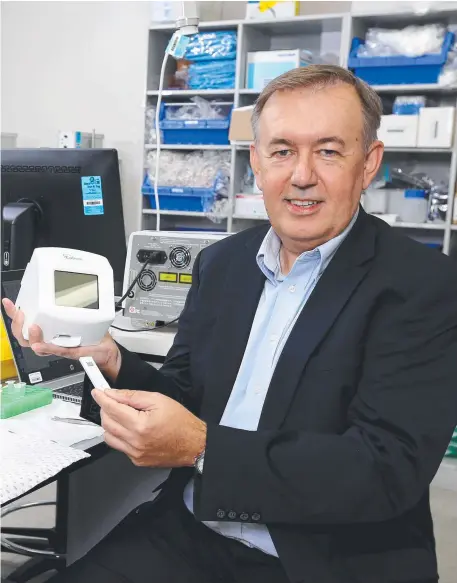  ?? Picture: David Clark ?? AnteoTech CEO Derek Thomson with the COVID-19 testing machine,