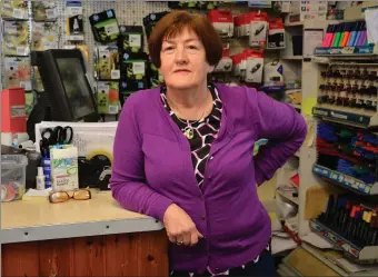  ?? Photo by Declan Malone ?? The door is closed on the Dingle Corner Shop on Main Street but proprietor Mary O’Sullivan is on the premises to provide stationery and other materials to phone-in customers.