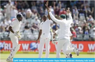  ??  ?? CAPE TOWN: File photo shows South Africa bowler Kagiso Rabada celebrates dismissing India bowler Wriddhiman Saha during day four of the First Test between South Africa and India in Cape Town. — AFP