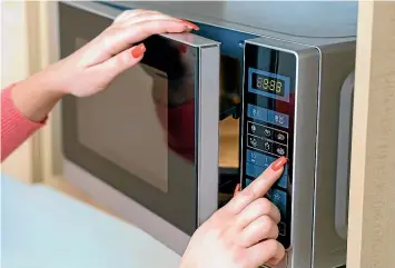  ??  ?? The first microwaves unveiled in 1947 were intended for use in restaurant­s, weighing more than 340 kilograms and standing at almost 170 centimetre­s tall. They cost, in today’s terms US$56,000.