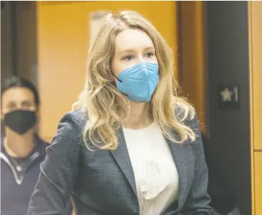  ?? NICK OTTO / AFP VIA GETTY IMAGES ?? Elizabeth Holmes, the founder and former CEO of blood testing and life sciences firm
Theranos, arrives for the first day of her fraud trial in San Jose, Calif., on Wednesday.